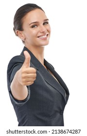 I approve. A businesswoman showing a thumbs-up to the camera.