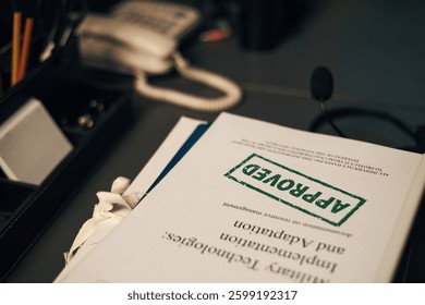 Approved Document with Notes on Office Desk