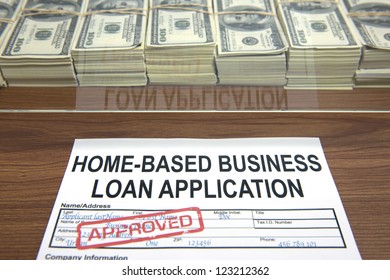 Approved Small Business Loan Application And Dollar Bills