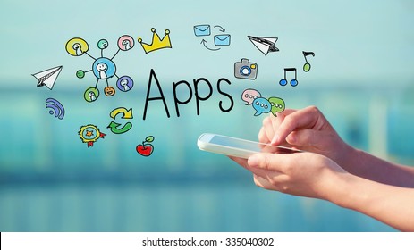Apps concept with person holding a smartphone  - Shutterstock ID 335040302
