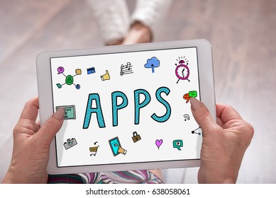 Apps concept shown on a tablet held by a woman