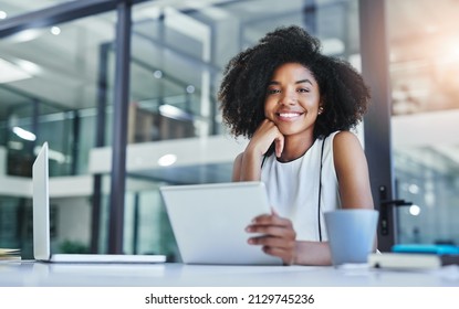 With apps like these your business will flourish. Cropped shot of an attractive young businesswoman working in her office. - Shutterstock ID 2129745236