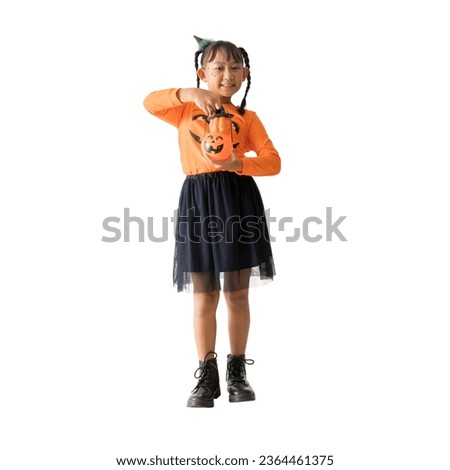 appy Asian child girl wear halloween witch costume with holding pumpkin standing posing full body portrait, isolated on white,  Clipping Paths for design work