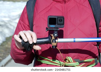 APR 03 2022 BATUMI GEORGIA Modern Brand New GO PRO 10 Action Camera Fixed To A Ski Pole In A Womans Hand