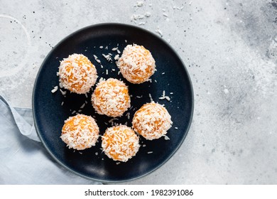 Apricot Coconut Protein Balls In Blue Bowl. Vegan Alternative Food. Copy Space. Top View. Selective Focus