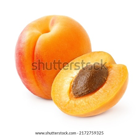 Apricot fruit with half of apricot and apricot kernel isolated on white background.