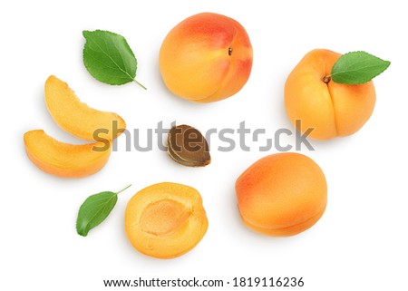apricot fruit with half and slices isolated on white background. Clipping path. Top view. Flat lay