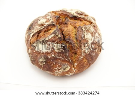 Similar – Image, Stock Photo A round loaf of bread lies on baking paper and is about to go into the oven