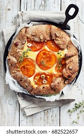 Apricot Wholegrain Galette With Cream Cheese Filling And Roasted Almond. Fruit Tart. Overhead View