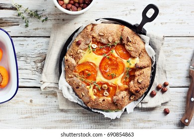 Apricot Wholegrain Galette With Cream Cheese Filling And Roasted Almond. Fruit Tart. Overhead View