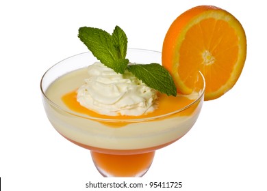 Apricot-orange And Lemon Parfait With Orange Sauce, Whipped Cream, Mint, And A Slice Of Orange.