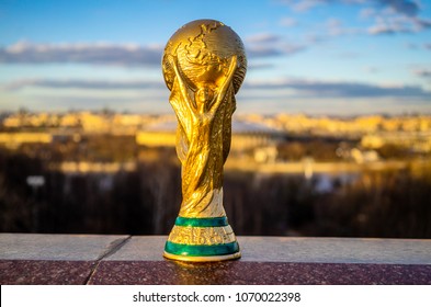 April 13, 2018 Moscow, Russia Trophy of the FIFA World Cup against the backdrop of the Luzhniki stadium in Moscow.