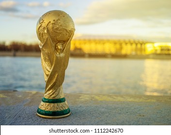 April 13, 2018 Moscow, Russia Trophy of the FIFA World Cup against the backdrop of the Luzhniki stadium in Moscow.