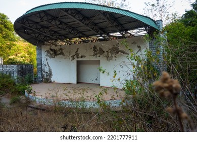 April 13th 2022. Uttarakhand India. Empty Remains Of A Dormant Outdoor Auditorium Building Full Of Wild Vegetation Growing All Around.