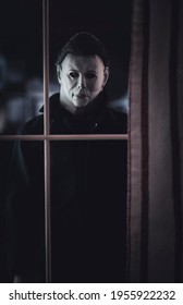 APRIL 14 2021: Halloween horror movie slasher Michael Myers staring through a window at the Doyle house - Trick or Treat Studios action figure