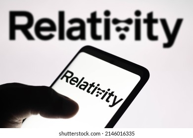 April 15, 2022, Brazil. In This Photo Illustration The Relativity Space Logo Seen Displayed On A Smartphone Screen And In The Background