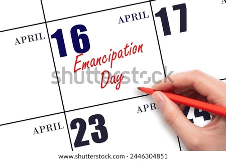 April 16. Hand writing text Emancipation Day on calendar date. Save the date. Holiday. Important date.