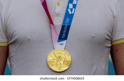 April 17, 2021 Tokyo, Japan. Gold medal of the XXXII Summer Olympic Games in Tokyo on the chest of the athlete.