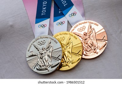 April 17, 2021 Tokyo, Japan. Gold, silver and bronze medals of the XXXII Summer Olympic Games in Tokyo on the chest of the athlete.