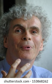 APRIL 18, 2005 - BERLIN: Conductor Sir Simon Rattle Speaks At A Press Conference In The Arena In Berlin.