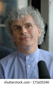 APRIL 2, 2005 - BERLIN: British Conductor Sir Simon Rattle At A Press Conference In Berlin.