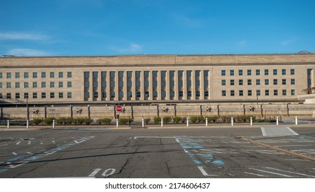 April, 2, 2022, Arlington, VA, Pentagon Building Exterior As Seen From The Parking Lot Under A Blue Sky