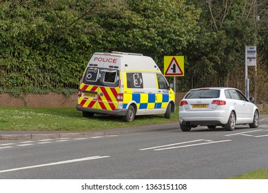 . April 2019. Police Van And Camera Checking For Speeding Motorists Parked On A Grass Verge In Kings Worthy, Hampshire, UK