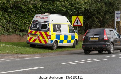 . April 2019. Police Van And Camera Checking For Speeding Motorists Parked On A Grass Verge In Kings Worthy, Hampshire, UK