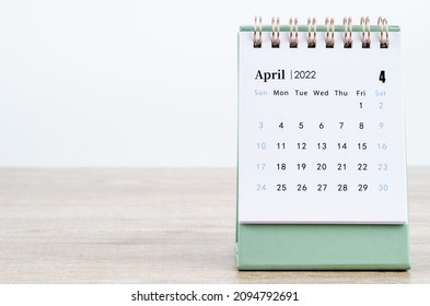 The April 2022 desk calendar on white. - Shutterstock ID 2094792691