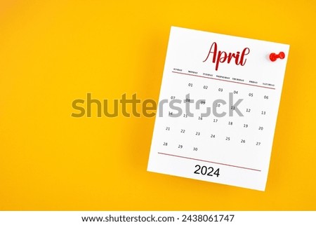 April 2024 calendar page with red push pin on yellow background.