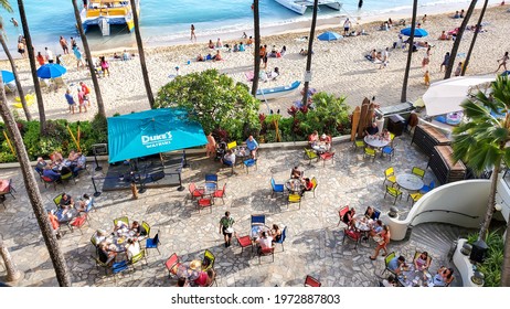 April 21, 2021, Waikiki Beach, Honolulu, Hawaii.  View of the restaurant on Waikiki beach after the state reopen the business and opening for tourists to enter the country.