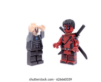 April 24,2017: A studio shot of a Tony stark and Deadpool With Lego compatible Mini-figure.Lego is extremely popular worldwide with children and collectors