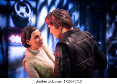 APRIL 26 2020: recreation of a scene from Star Wars The Empire Strikes Back where Han Solo embraces Princess Leia Organa aboard the Millenium Falcon - Hasbro Action Figure