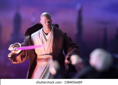 APRIL 27 2019: Jedi Master Mace Windu Confronting Senator Palpatine With Coruscant Cityscape In Background.
