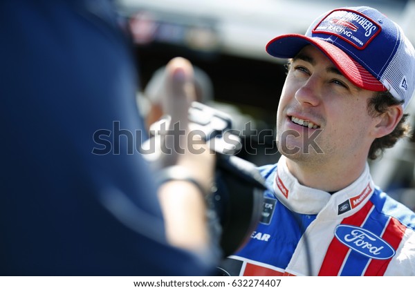 April 28,\
2017 - Richmond, Virginia, USA: Ryan Blaney (21) hangs out in the\
garage before practice for the Toyota Owners 400 at Richmond\
International Speedway in Richmond,\
Virginia.