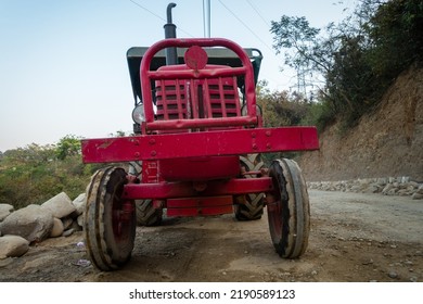 April 2nd 2022. Dehradun Uttarakhand India. A Closeup Frontal Shot Of A Red Tractor Vehicle.