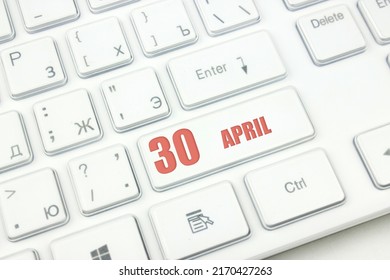 April 30th. Day 30 Of Month, Calendar Date. Cropped View Of Modern White Computer Keyboard With Calendar Date. Concept Workspace, Freelance, Deadline.  Spring Month, Day Of The Year Concept