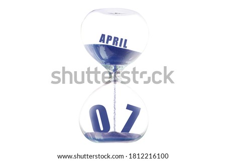 april 7th. Day 7 of month, Hour glass and calendar concept. Sand glass on white background with calendar month and date. schedule and deadline spring month, day of the year concept.