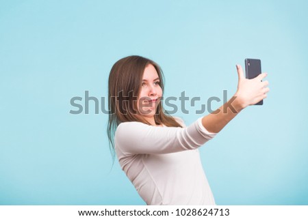 April fools day concept - fool crazy woman make selfie. happy expression