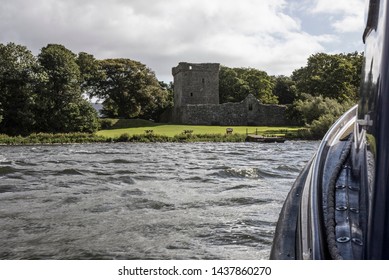 Aproaching Loch Leven Castle Whit A Boat.