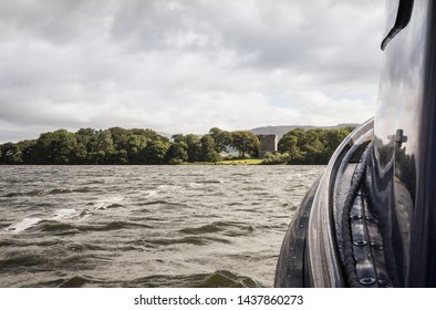 Aproaching Loch Leven Castle Whit A Boat.