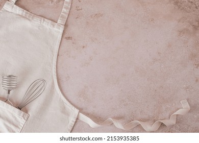 Apron And Utensils Baking Desserts. Cookie Pie Or Cake Recipe Mockup. Top View. High Quality Photo