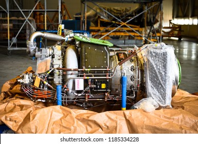 APU Means Auxiliary Power Unit. It Is Located On Tailend Of Commercial Aircrafts. It Is Actually A Small Jet Engine. The APU Is A Small Jet Engine The Larger Jet Engines.