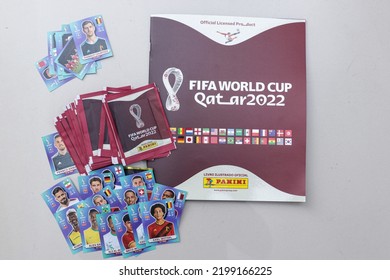 Apucarana, Brazil - 09.07.2022 - Book And Sticker Packs Of World Cup Players Figurines. Fifa World Cup 2022 - Qatar 2022 Album