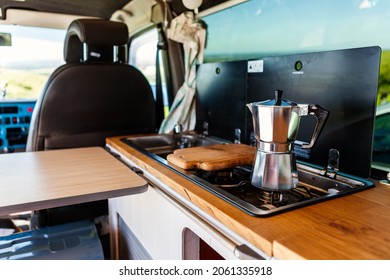 Aqua bialetti coffee maker on a camper van hob, in a T4 camper van