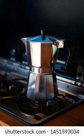 Aqua Bialetti stovetop coffee maker, on a van gas cooker