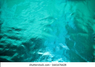 Aqua Teal Turquoise Color Metallic Foil Background - Shutterstock ID 1661676628