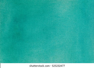 Aquamarine watercolor canvas background. Evenly colored horizontal surface.