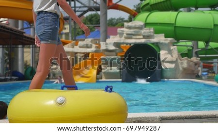 aquapark and water park. water park People bathe in the water park. Summer view entertainment fun in the pool lifestyle