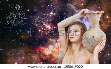 Aquarius Zodiac Sign. Astrology and horoscope concept. Beautiful woman Aquarius on the galaxy background